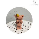 Шоколадна фігурка "Ведмедик, що задуває свічку"