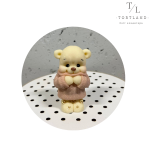 Шоколадна фігурка "Ведмедик білий  в светрику бежевому"