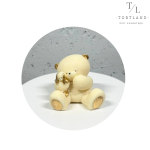 Шоколадна фігурка "Ведмедик білий з іграшкою"