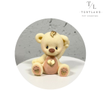 Шоколадна фігурка "Ведмедик зі сердечком біло-коричневий"