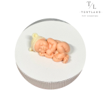 Шоколадна фігурка "Дитинка в шапочці біла"