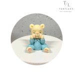 Шоколадна фігурка "Ведмежа-малюк в блакитному комбінезоні"