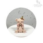 Шоколадна фігурка "Ведмедик в ковпачку бежевий"