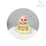 Шоколадна фігурка "'Зайка з льодяником та бантиком"